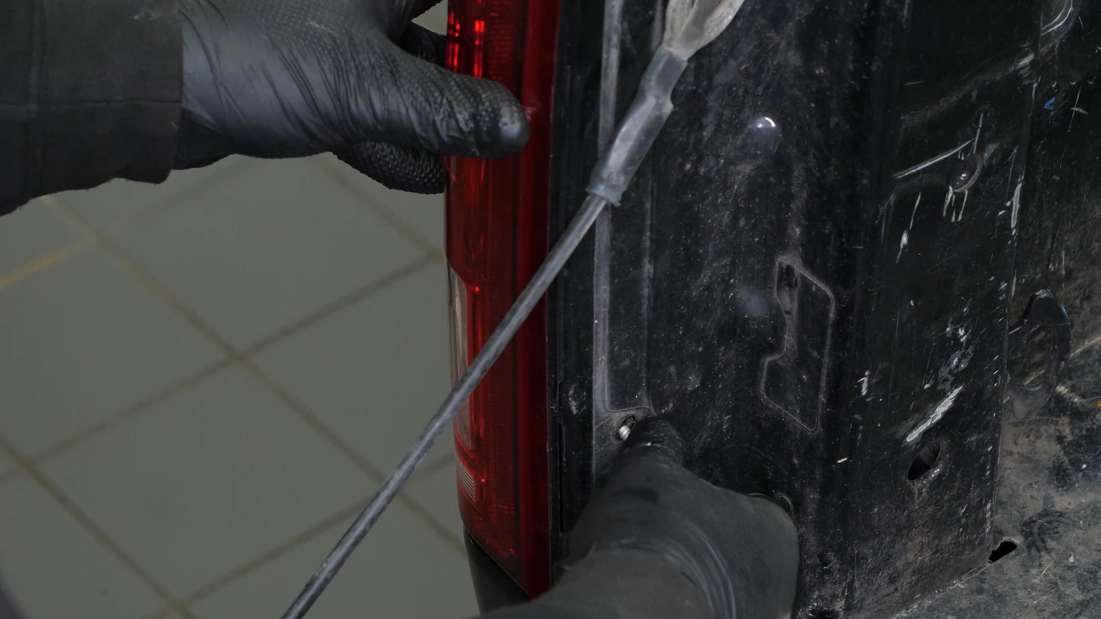 Remove the tail light housing