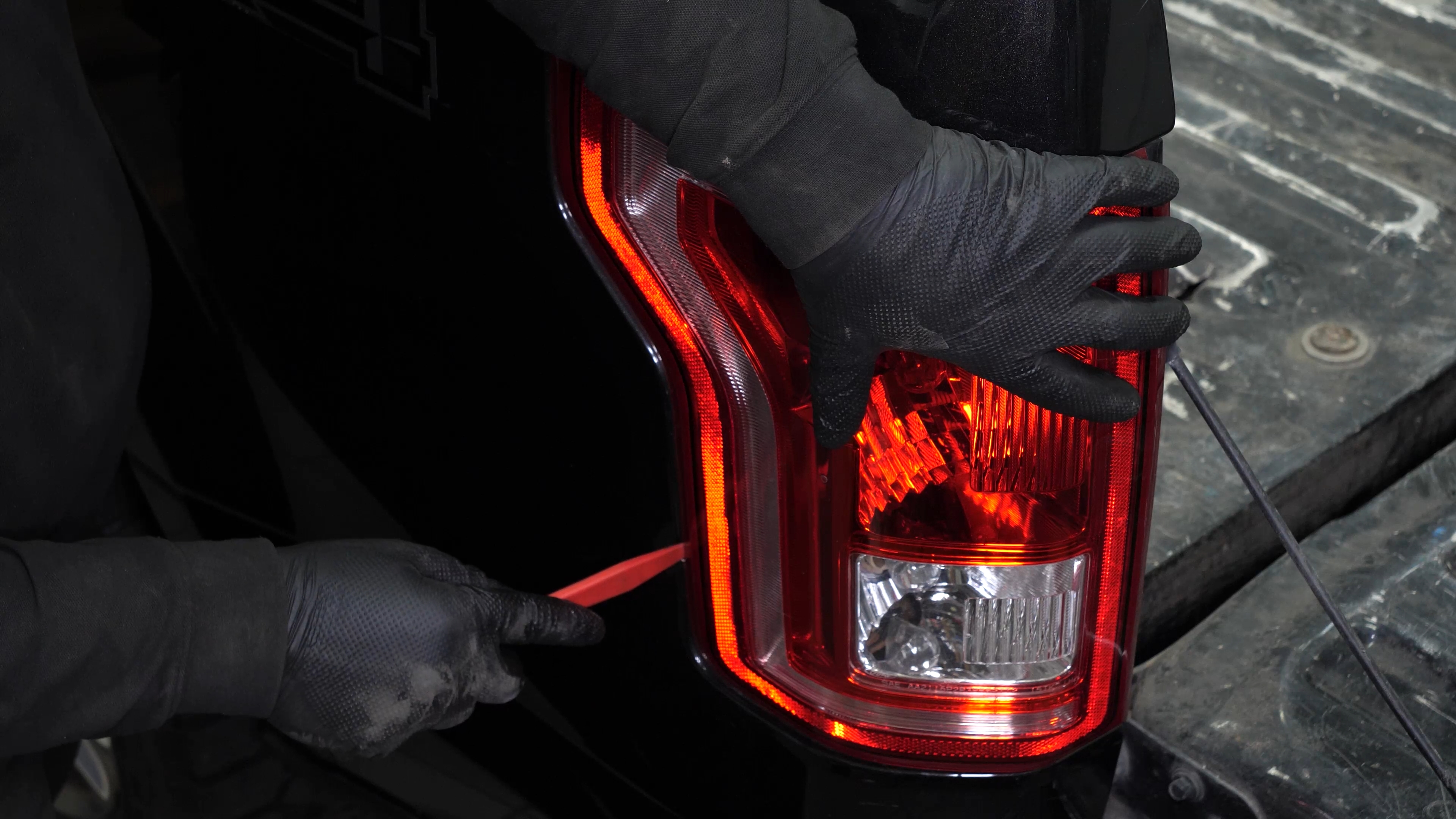 Remove the tail light housing