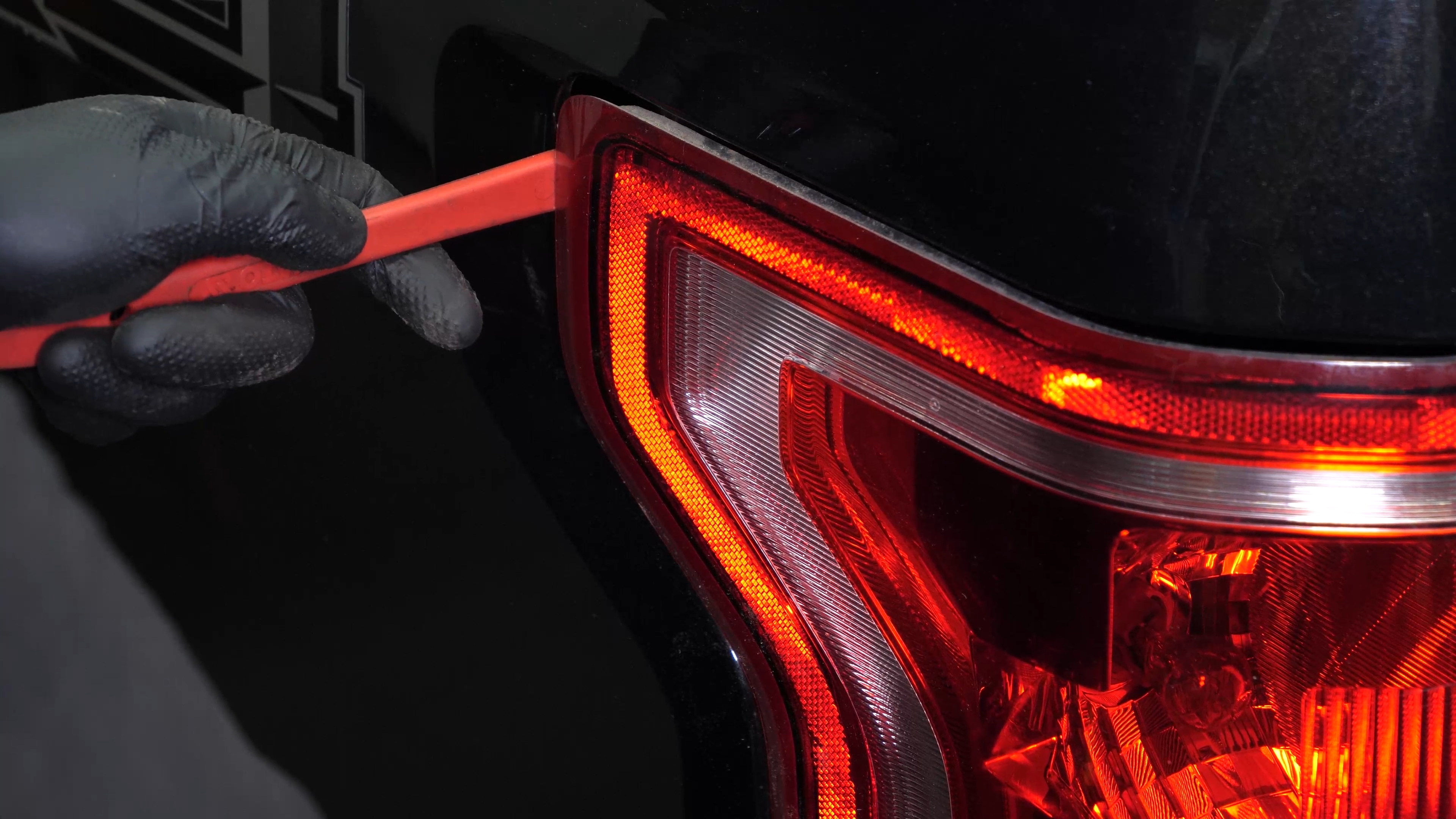 Remove the tail light housing