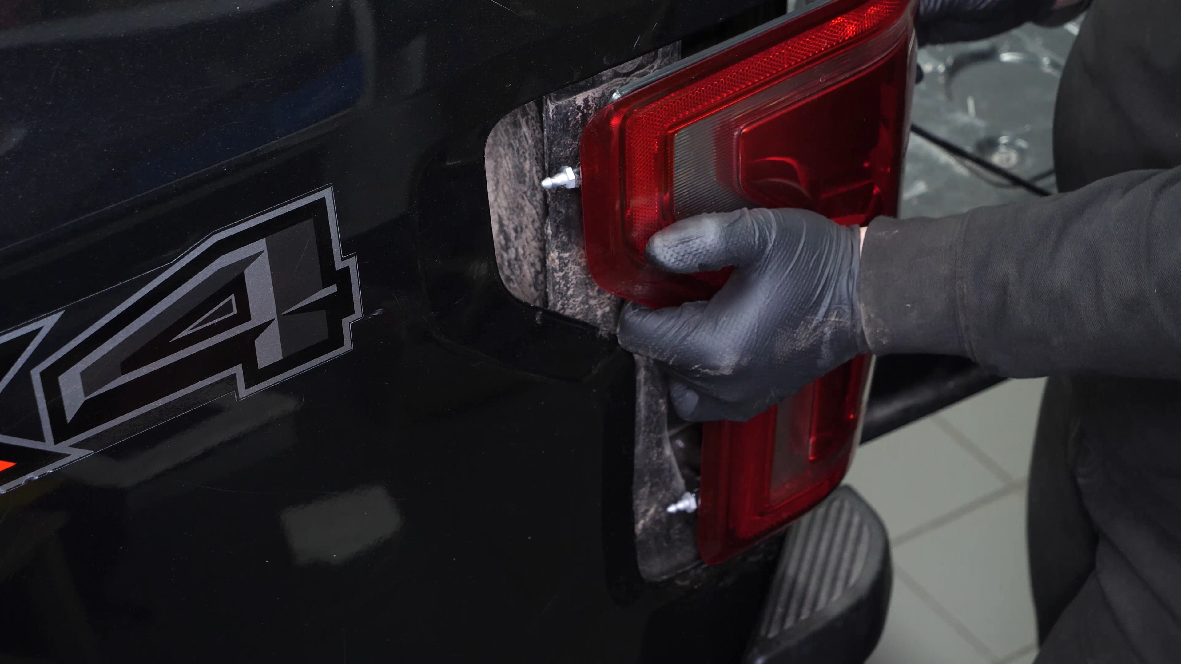 Put the tail light housing back