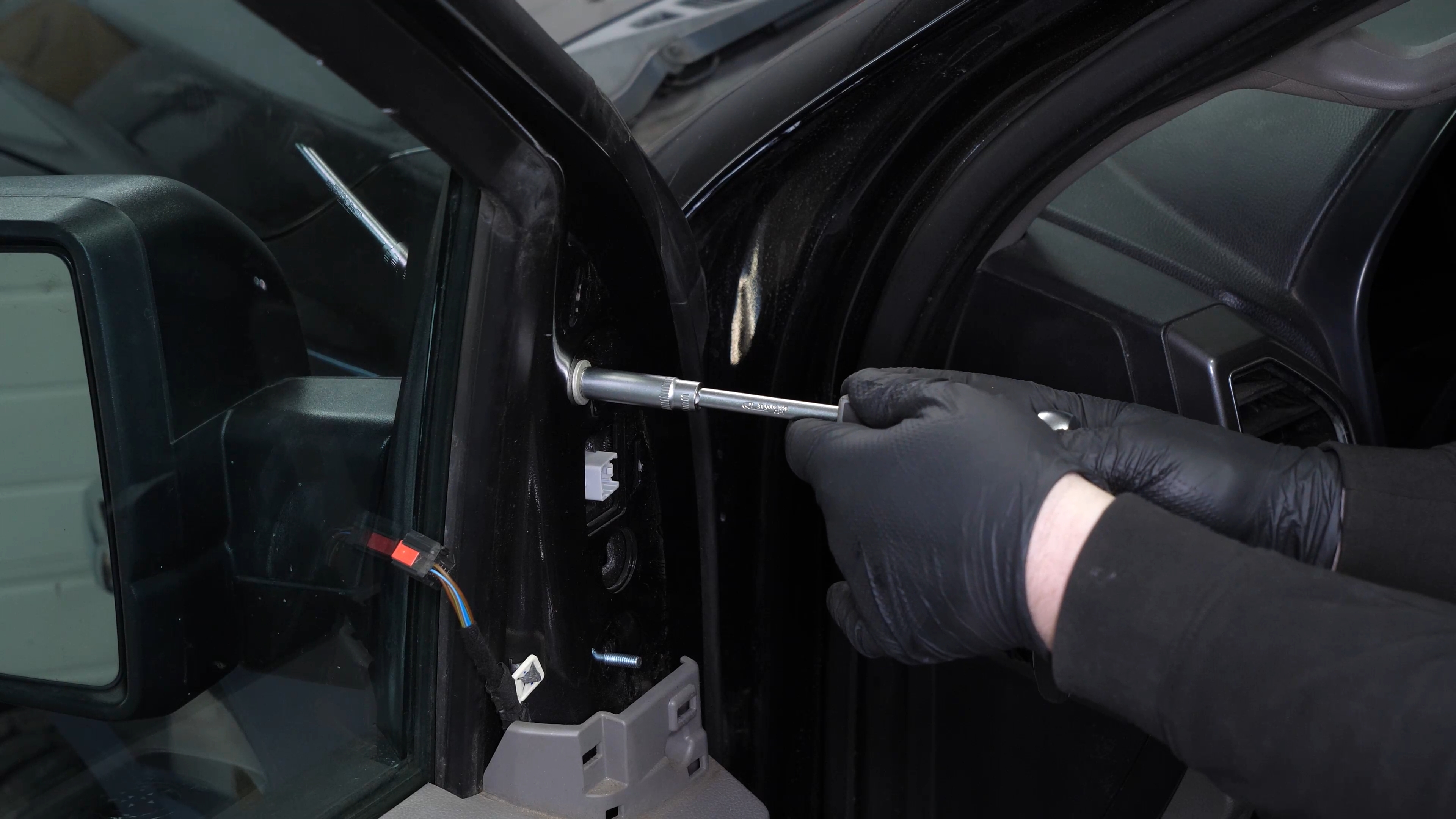 Install the new side view mirror