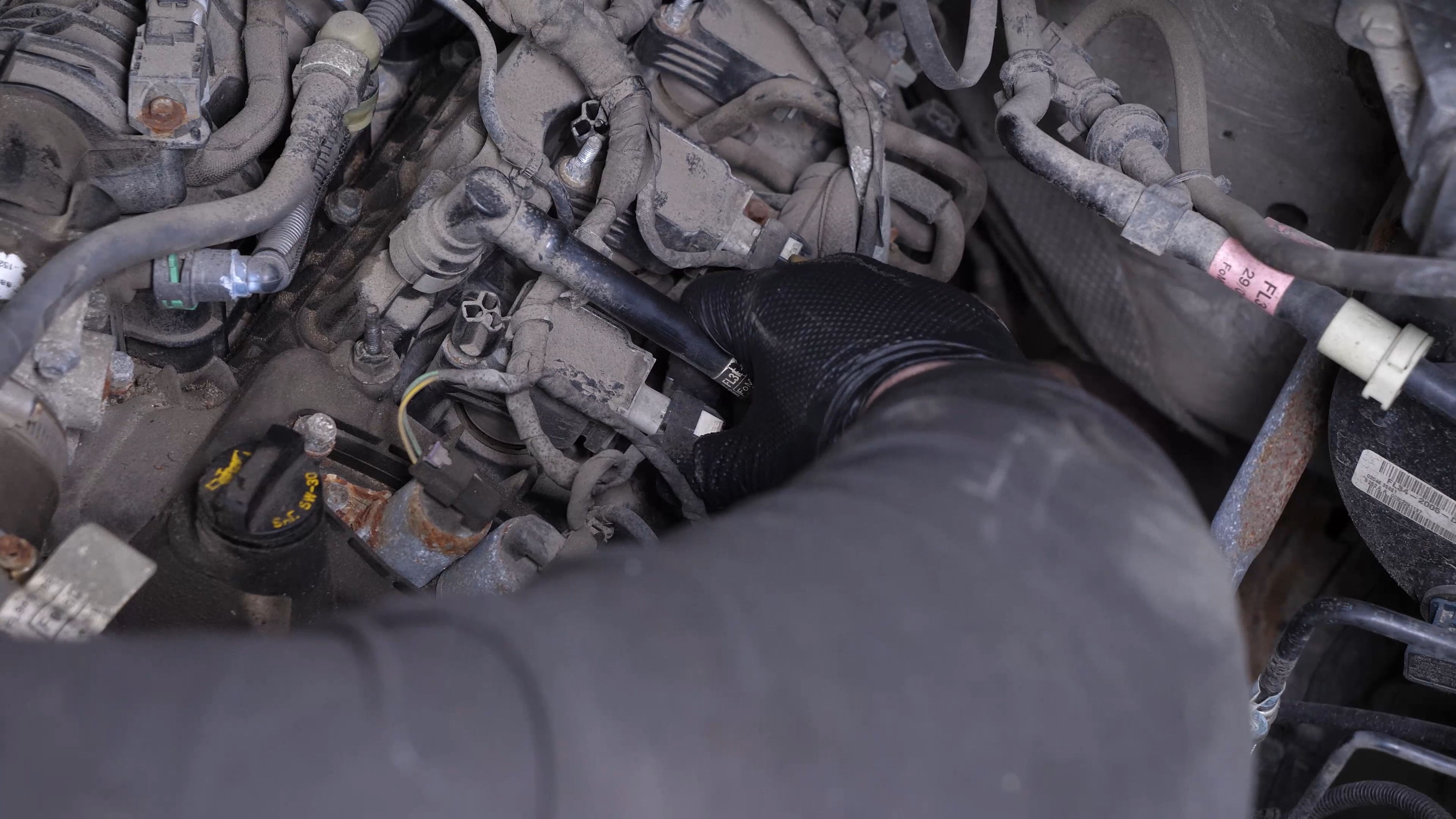 Disconnect the ignition coil