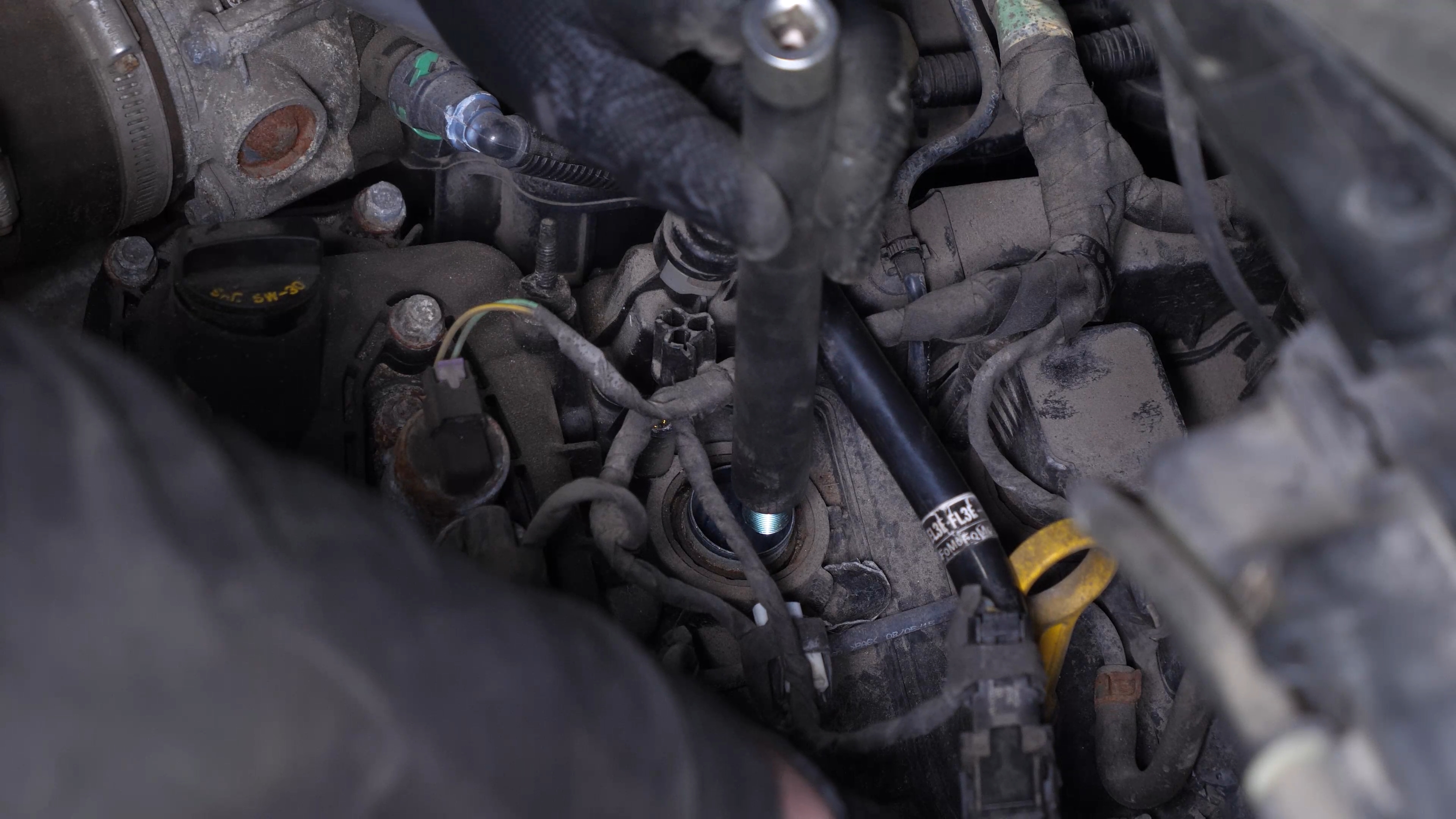 Install the new spark plugs