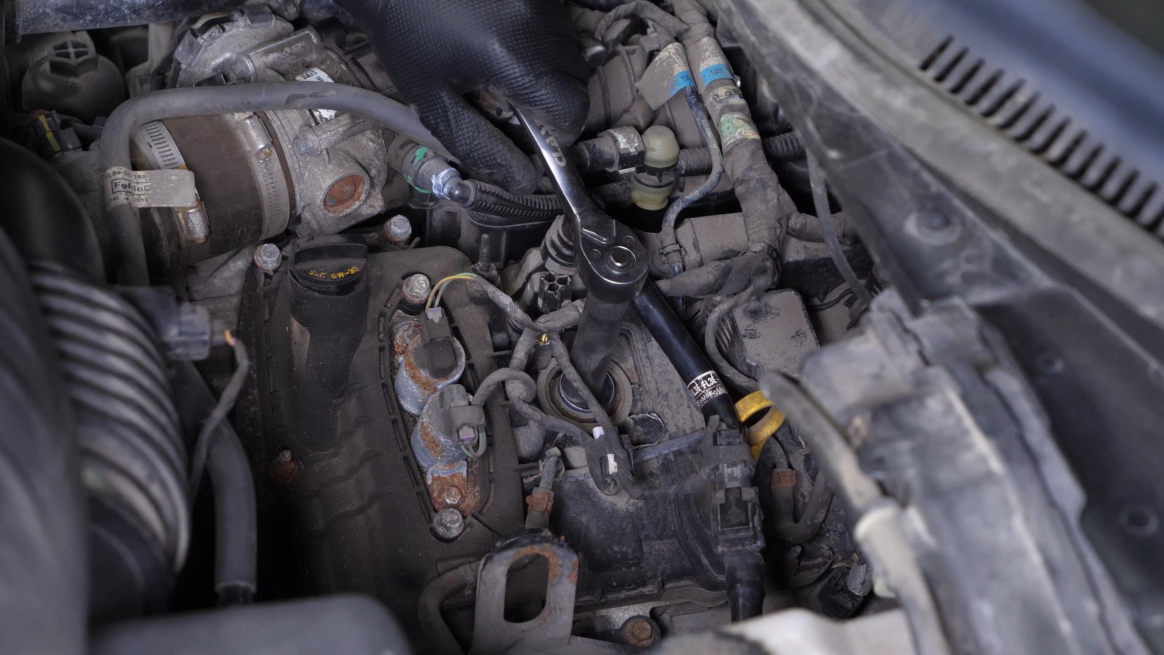 Install the new spark plugs