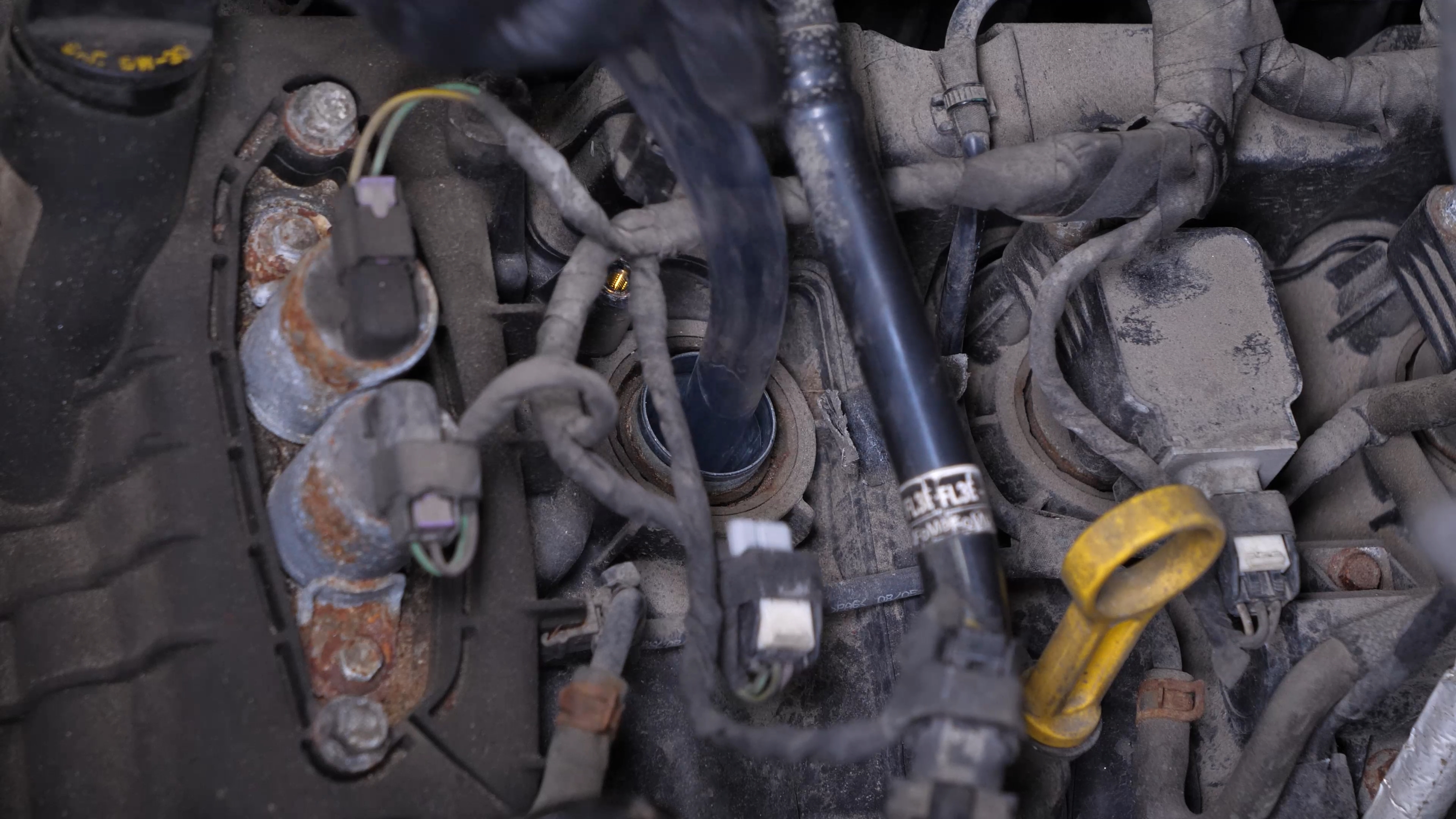 Clean around the spark plug
