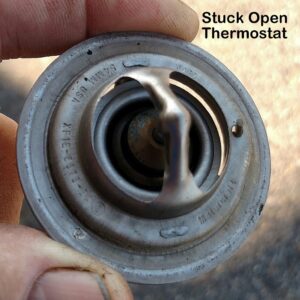stuck open thermostat