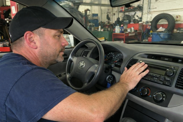 mechanic testing air conditioning unit