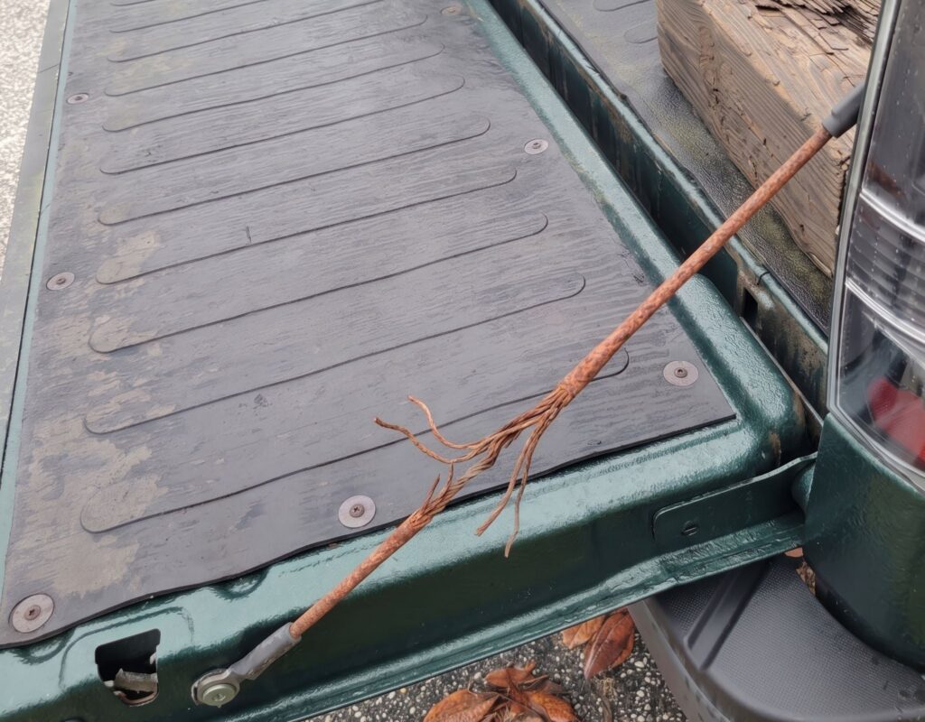 frayed rusted tailgate cable