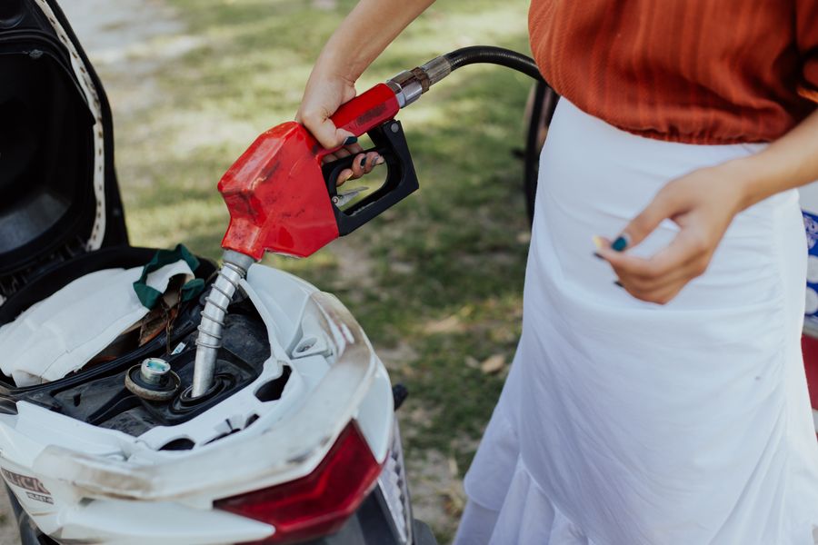 topping up gas on a scooter
