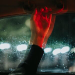 hand on car grab handle