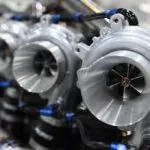 man capturing photo of car turbos