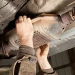 Detaching the catalytic converter from the exhaust system