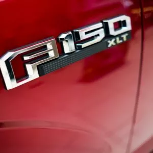 ford f 150 emblem on side of a truck