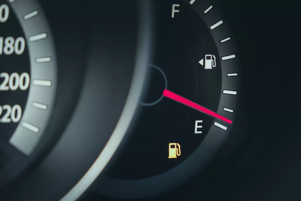 dash gauge showing low fuel