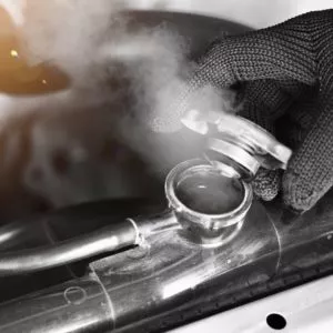 smoke rising from hot car radiator