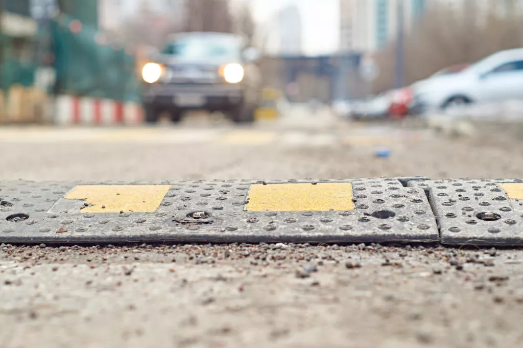 car approaching speedbump
