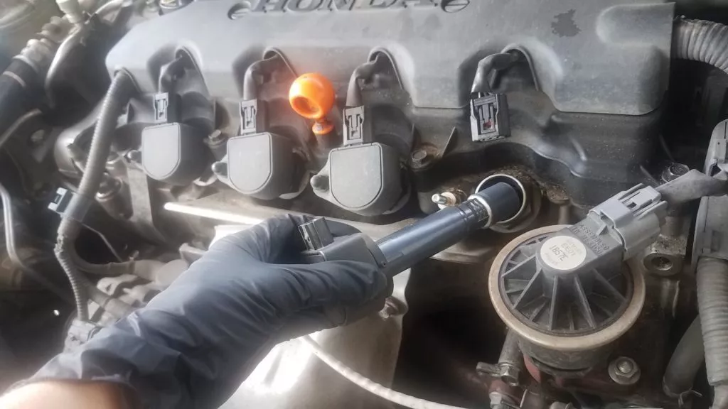 removing ignition coil from the spark plug