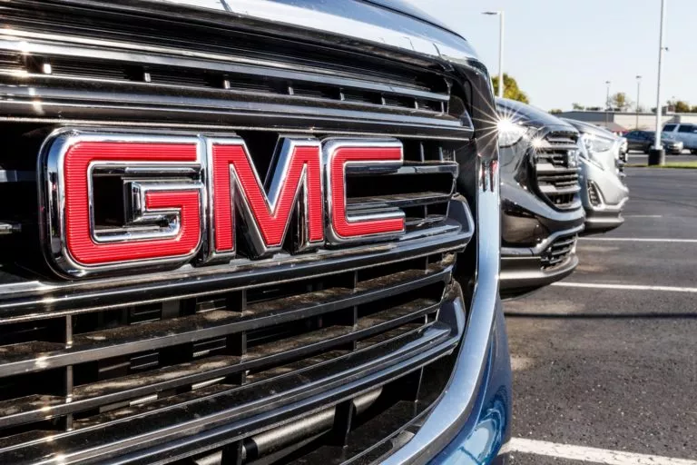 closeup of gmc logo on truck grille
