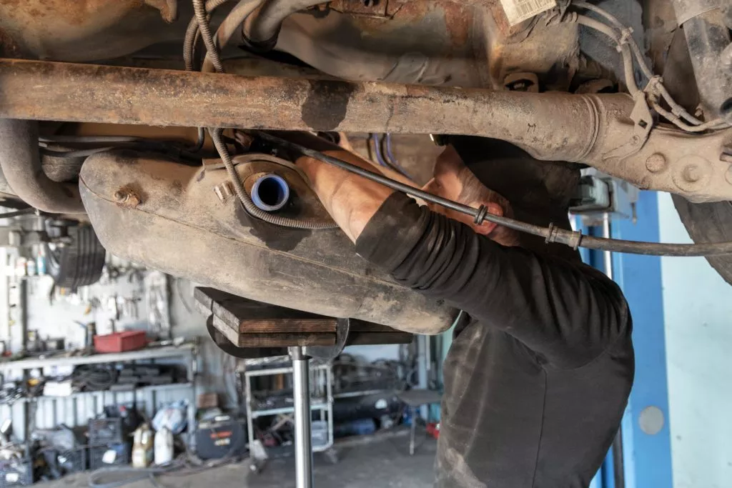 Car repair and fuel tank replacement