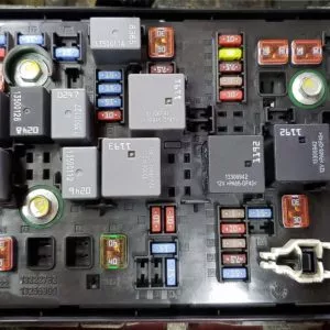 automotive multiple rows of different fuses one connector and part of a relay
