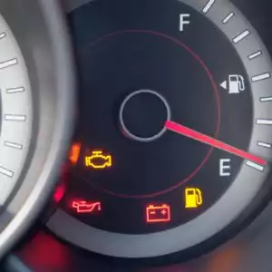 Fuel gauge with warning indicating low fuel tank