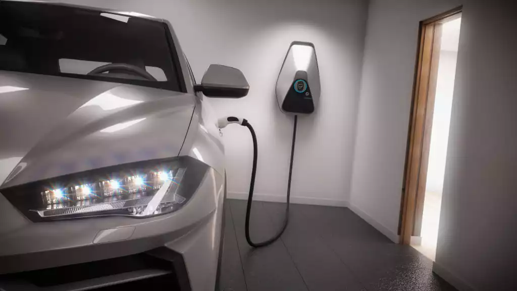 white electric car charging at home in garage.jpg