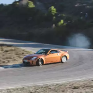 Gold Nissan 350Z Rounding Corner