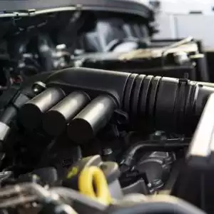 car engine showing portion of the intake manifold