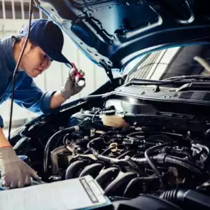 mechanic flashes light to find crankshaft position sensor