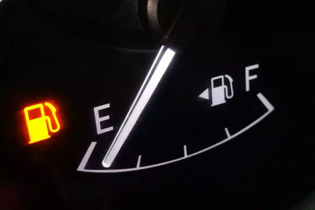 fuel level low and low fuel warning light on