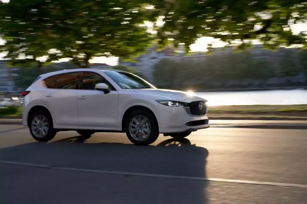 white 2022 mazda cx 5 on the road