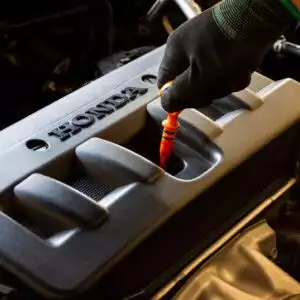 car honda engine undergoing tune up