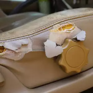 badly damaged car seat