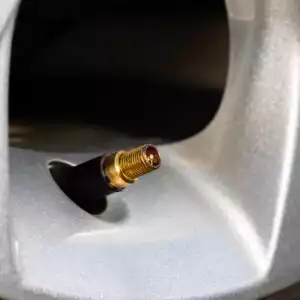 car tire valve stem visible