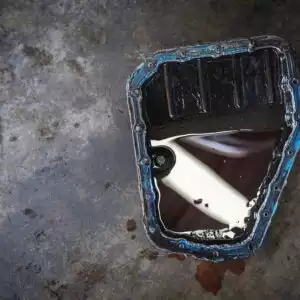 old transmission fluid on a transmission pan
