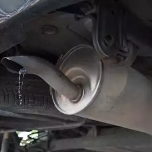 car tailpipe with water coming out