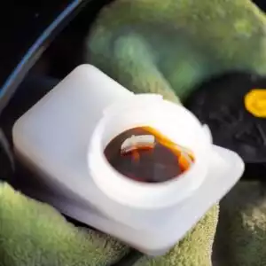 brake fluid reservoir with a dirty brake fluid