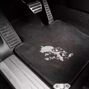 spilled milk on a car's carpet