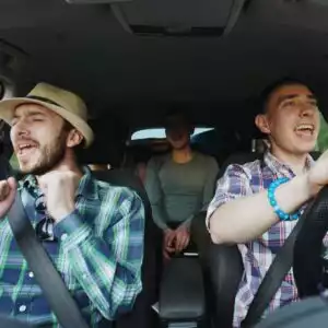 passengers of a car singing all together