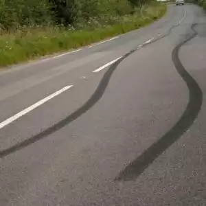 road with car skid marks