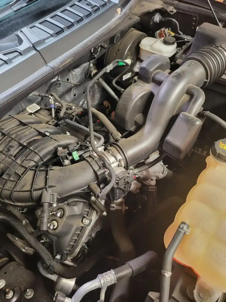 master cylinder with brake fluid reservoir in engine bay