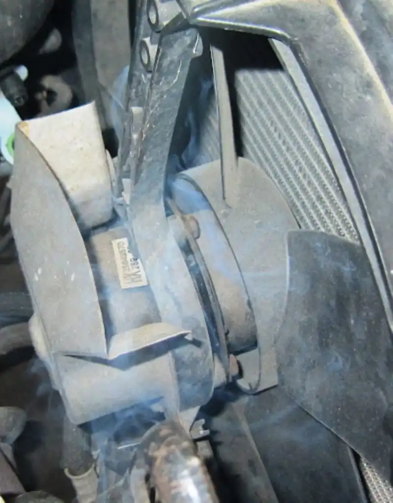 image of a broken condenser fan motor