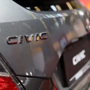 close up shot of a honda civic logo