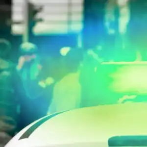 patrol car with flashing green light