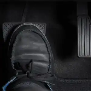 foot stepping on the brake pedal