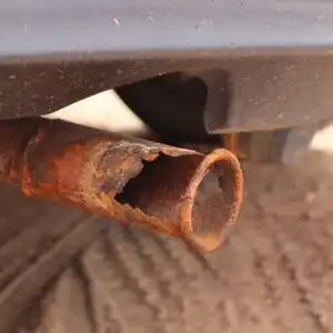 rusty exhaust pipe with big hole