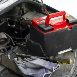 open engine hood with battery