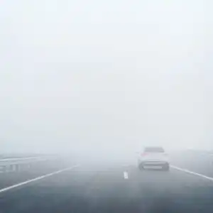 car on a foggy highway