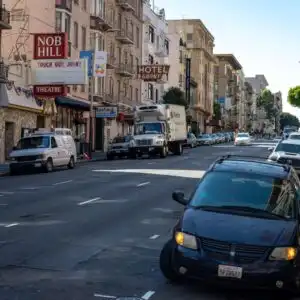 cars parked on an inclined street