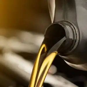 pouring automotive oil